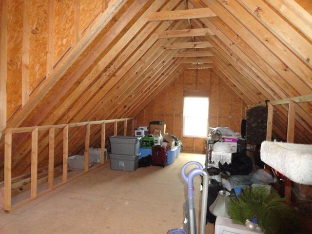 705 Crescent Road Murfreesboro, TN 37128 - Photo 24 of 30 One side of upstairs storage/expandable area would be great for a large bonus room (stairs exit to this side)