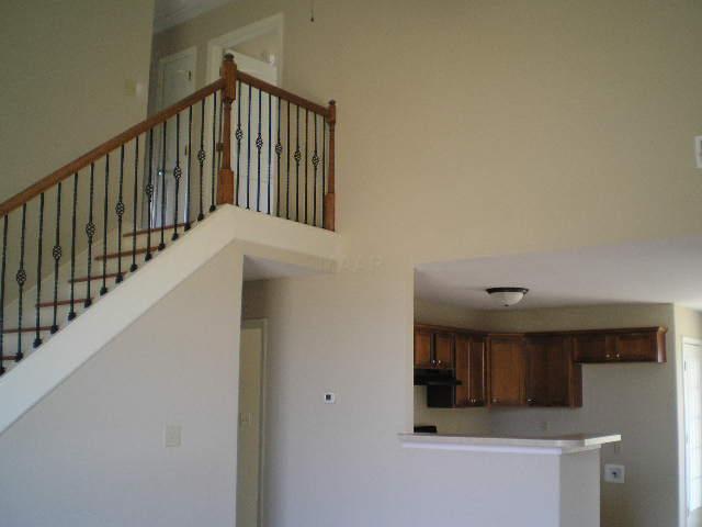 222 Hummingbird Loop Atoka, TN 38004 - Photo 2 of 7 Lovely Wrought Iron Rails with Real Wood Steps! Such a nice touch.