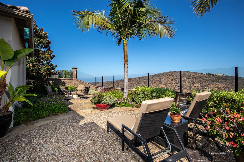7091 Sitio Caliente Carlsbad, CA 92009 - Photo 21 of 23 Low Maintenance drought tolerant landscape in bloom year round compliments the Forever Views!