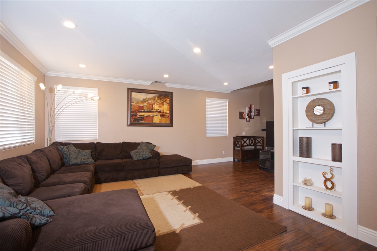 1270 Riviera Summit Road San Diego, CA 92154 - Photo 7 of 25 Bookshelf is actually a Murphy door hidden entrance to a secret room!