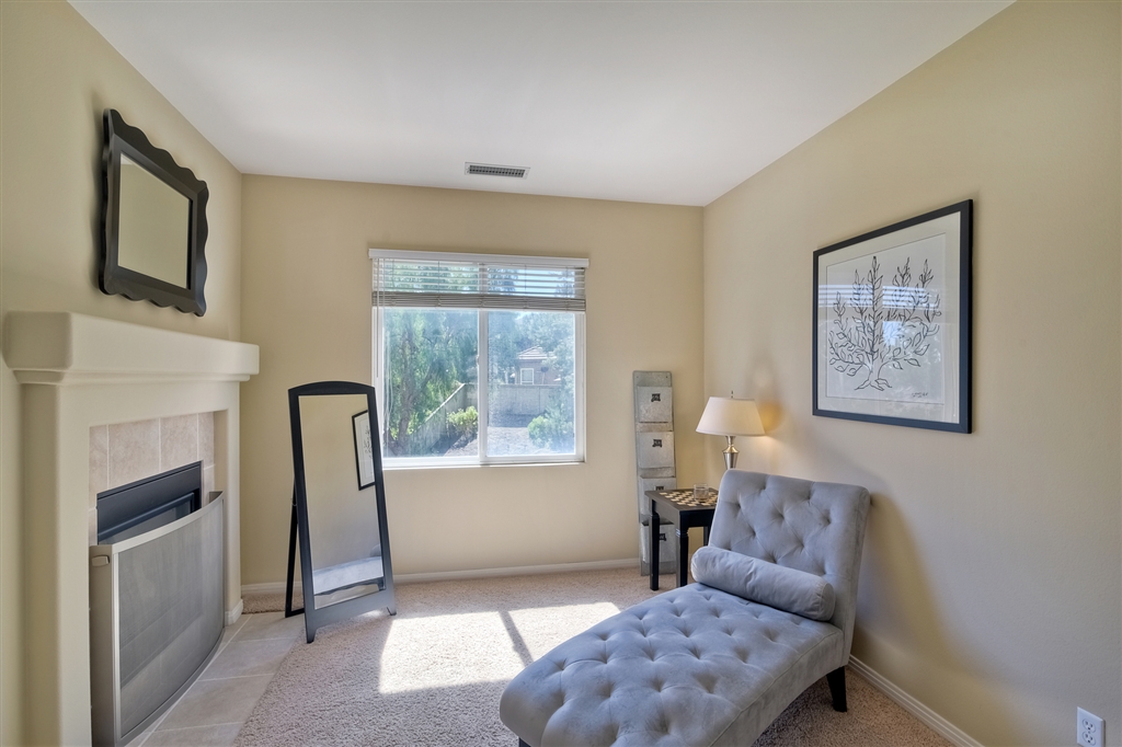 1062 Inverlochy Drive Fallbrook, CA 92028 - Photo 19 of 25 Master bedroom retreat and fire place