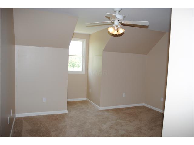 668 Ballard Road Piperton, TN 38017 - Photo 10 of 12 The upstairs 3rd bedroom is spacious with large closet.