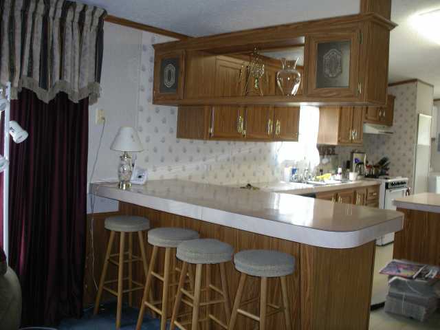 755 Whaley Road Covington, TN 38019 - Photo 6 of 10 Kitchen with bar area.