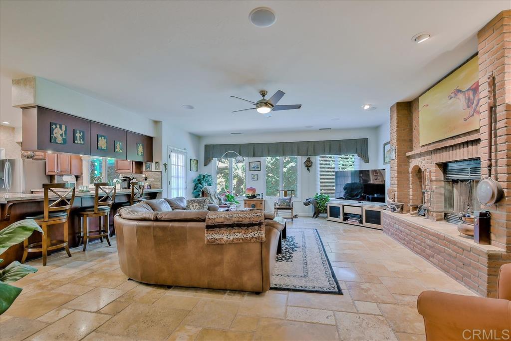 1606 Joshua Tree Lane Fallbrook, CA 92028 - Photo 10 of 25 The family room is just off the kitchen...huge and with a fireplace!