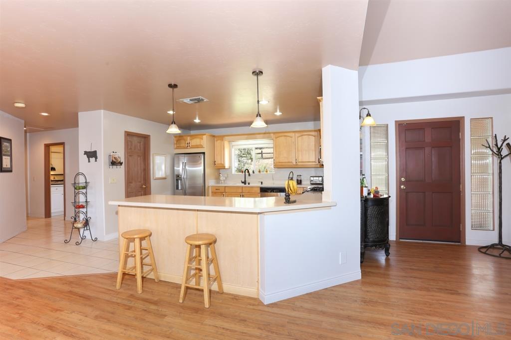 18921 Highway 94 Dulzura, CA 91917 - Photo 8 of 25 Looking towards kitchen and pantry from living room