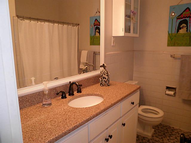 7548 Willey Road Germantown, TN 38138 - Photo 17 of 24 New quartz custom made vanity with oil rubbed bronze faucet.