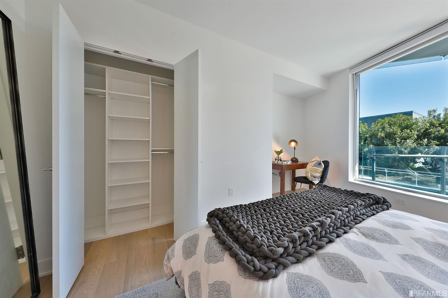 201 Folsom Street, Unit 10G San Francisco, CA 94105 - Photo 11 of 31 The master has 2 closets both with custom built-ins.