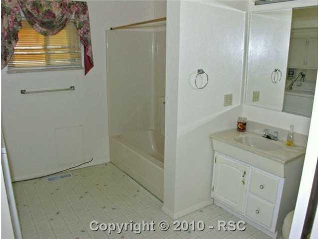 3975 Ridgeway Lane Colorado Springs, CO 80908 - Photo 13 of 16 Full bath by 4th bedroom.