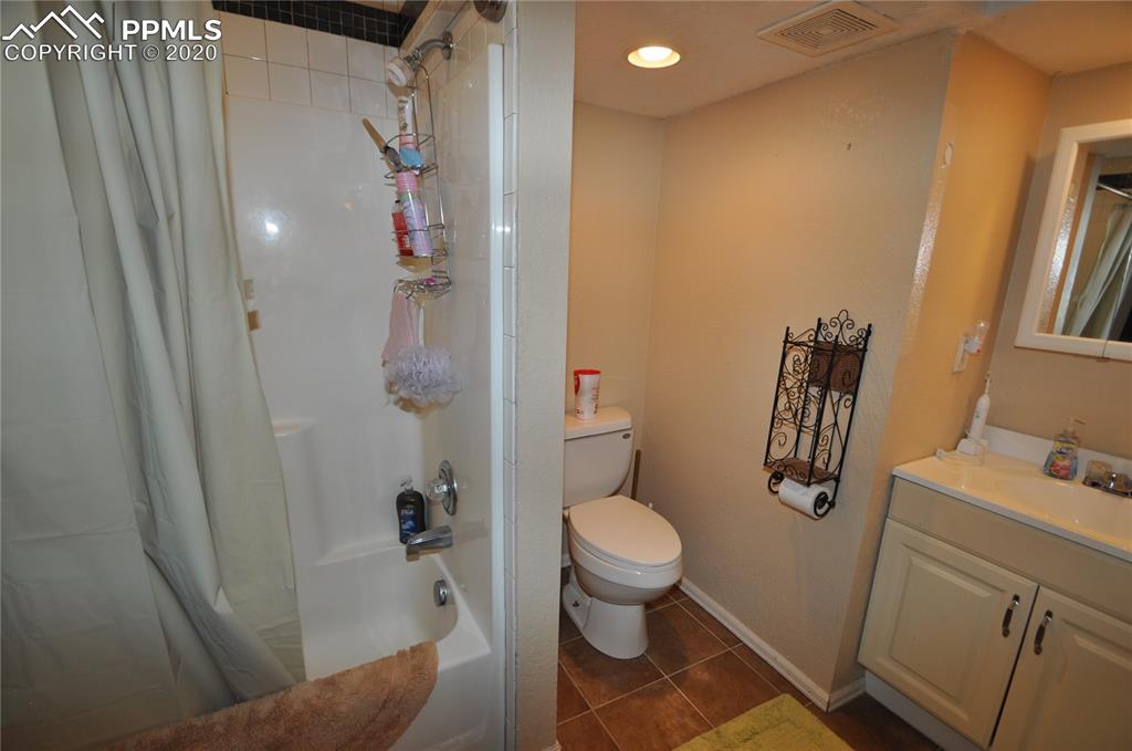36825 East Jones Road Yoder, CO 80864 - Photo 23 of 36 Basement-level full bathroom.