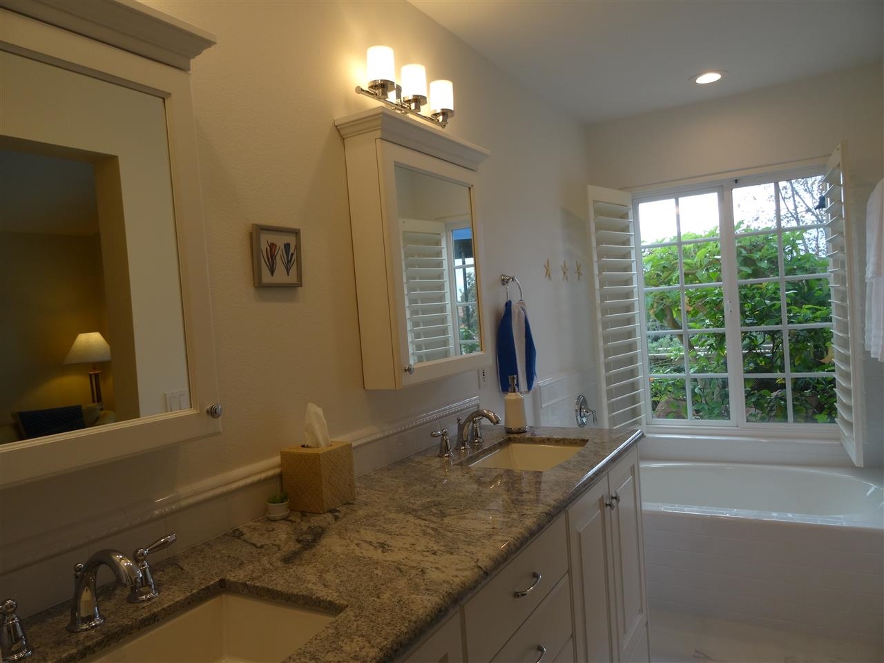 13312 Pantera Road San Diego, CA 92130 - Photo 8 of 25 Newly remodeled bathroom with custom cabinets & granite counter tops.