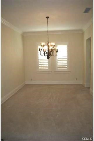 29 Marble Sands Newport Beach, CA 92660 - Photo 3 of 5 Formal dining room off the kitchen with butler pantry and walk-in pantry. So much storage!