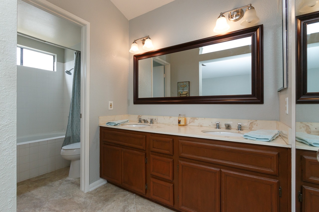 2040 Crosscreek Road Chula Vista, CA 91913 - Photo 14 of 25 Stained vanity and new fixtures