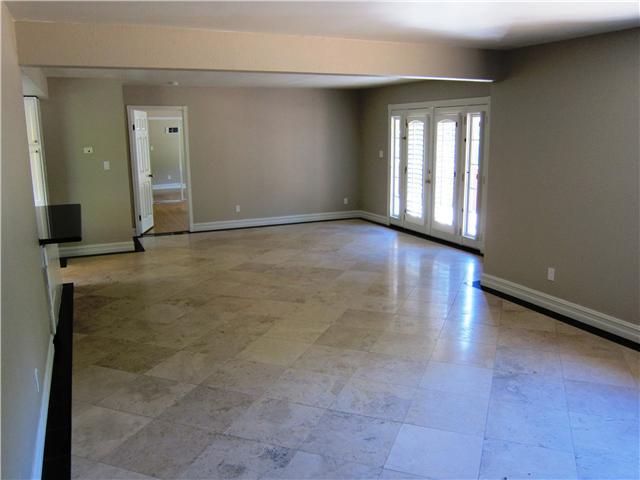 4290 Pala Road Fallbrook, CA 92028 - Photo 11 of 18 UPSTAIRS UNIT 4290B LIVING & DINING ROOM AREA, TRAVERTINE FLOORING, FRENCH DOORS W/PLANTATION SHUTTERS LEADING TO 30'X8' SLATE DECK!
