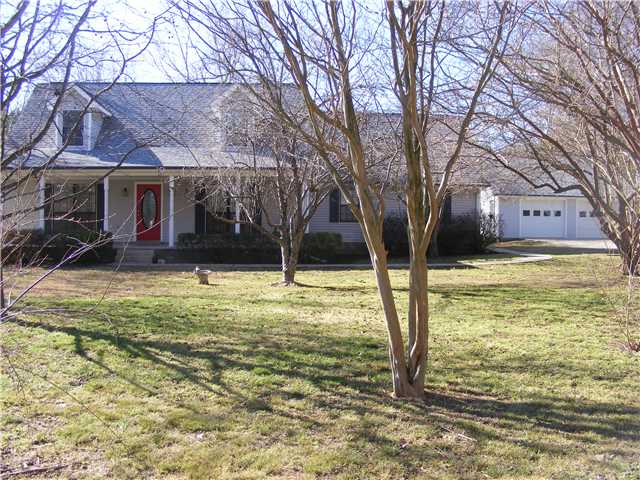 417 McQuiston Road Brighton, TN 38011 - Photo 1 of 12 Beautiful trees! This home is located in the wonderful Harmon Estates. Fruit trees in backyard! This home sits on 1.28 Acres!!