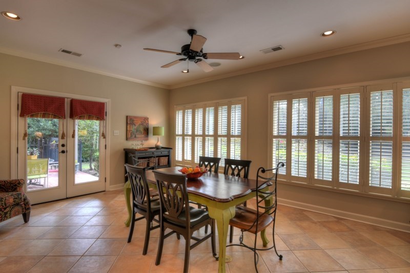 5089 Walnut Grove Road Memphis, TN 38117 - Photo 9 of 25 18x15 Breakfast Room with Tile Floor, Smooth Ceiling, Recessed Lighting and a Wall of Windows Overlooking the Lovely Rear Grounds
