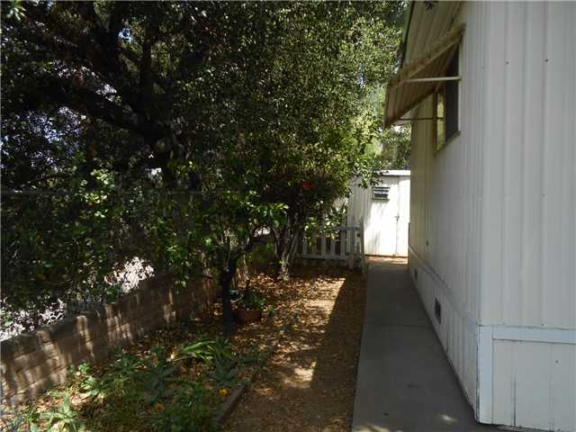 1120 East Mission Road, Unit 12 Fallbrook, CA 92028 - Photo 5 of 20 Side yard