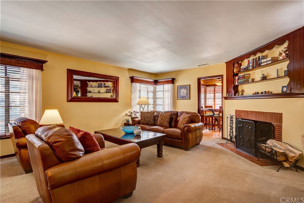 13719 Philadelphia Street Whittier, CA 90601 - Photo 9 of 45 Spacious formal living room with fireplace