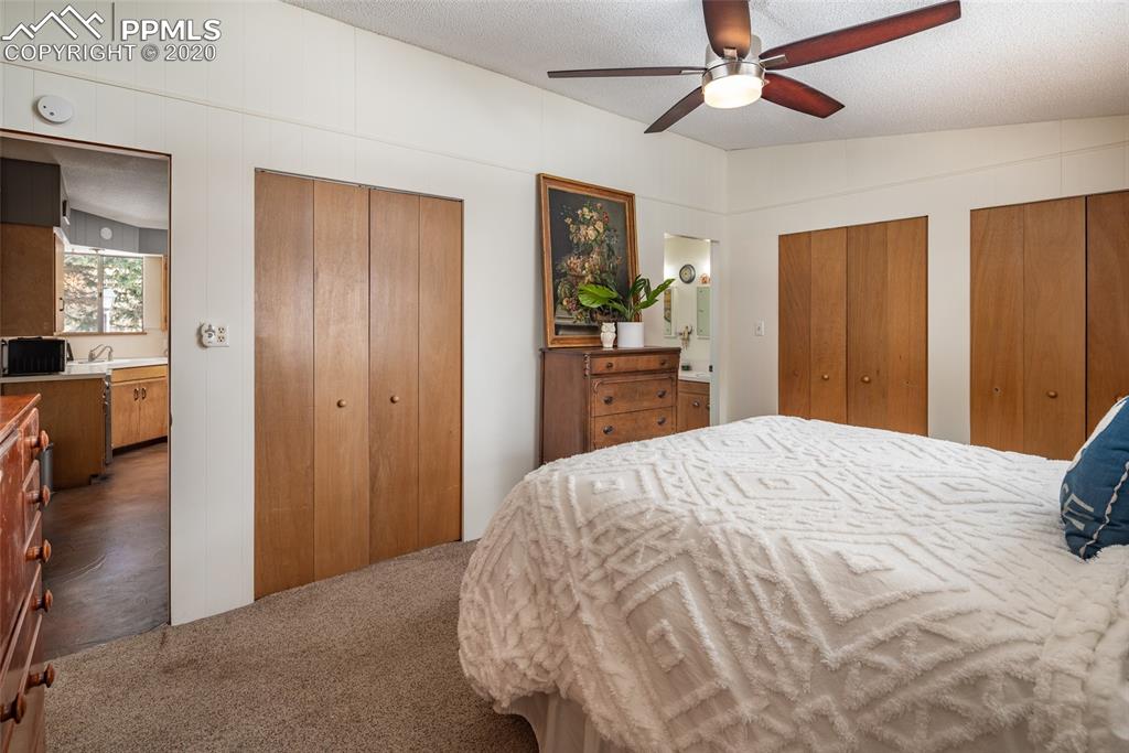 8715 Chipita Park Road Cascade, CO 80809 - Photo 22 of 33 Master bedroom has vaulted ceilings and lots of closet space.