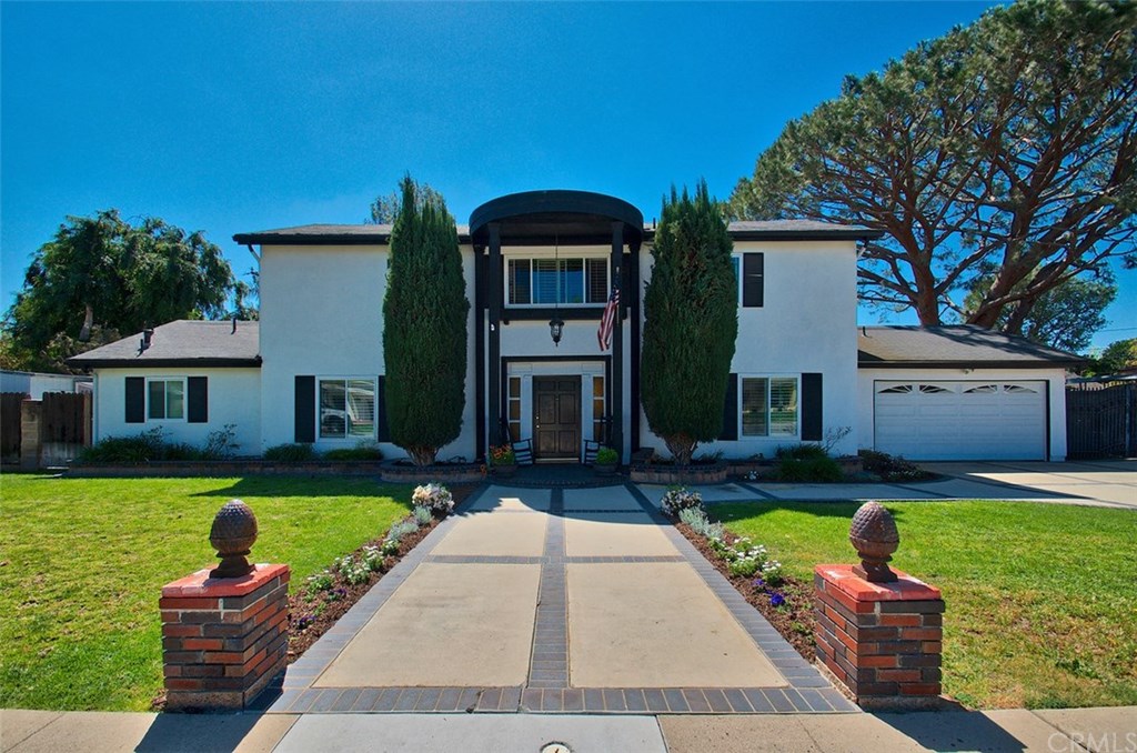 1162 Huntridge Road North Tustin, CA 92705 - Photo 1 of 1 1162 Huntridge with welcoming curb appeal in a quiet North Tustin neighborhood.