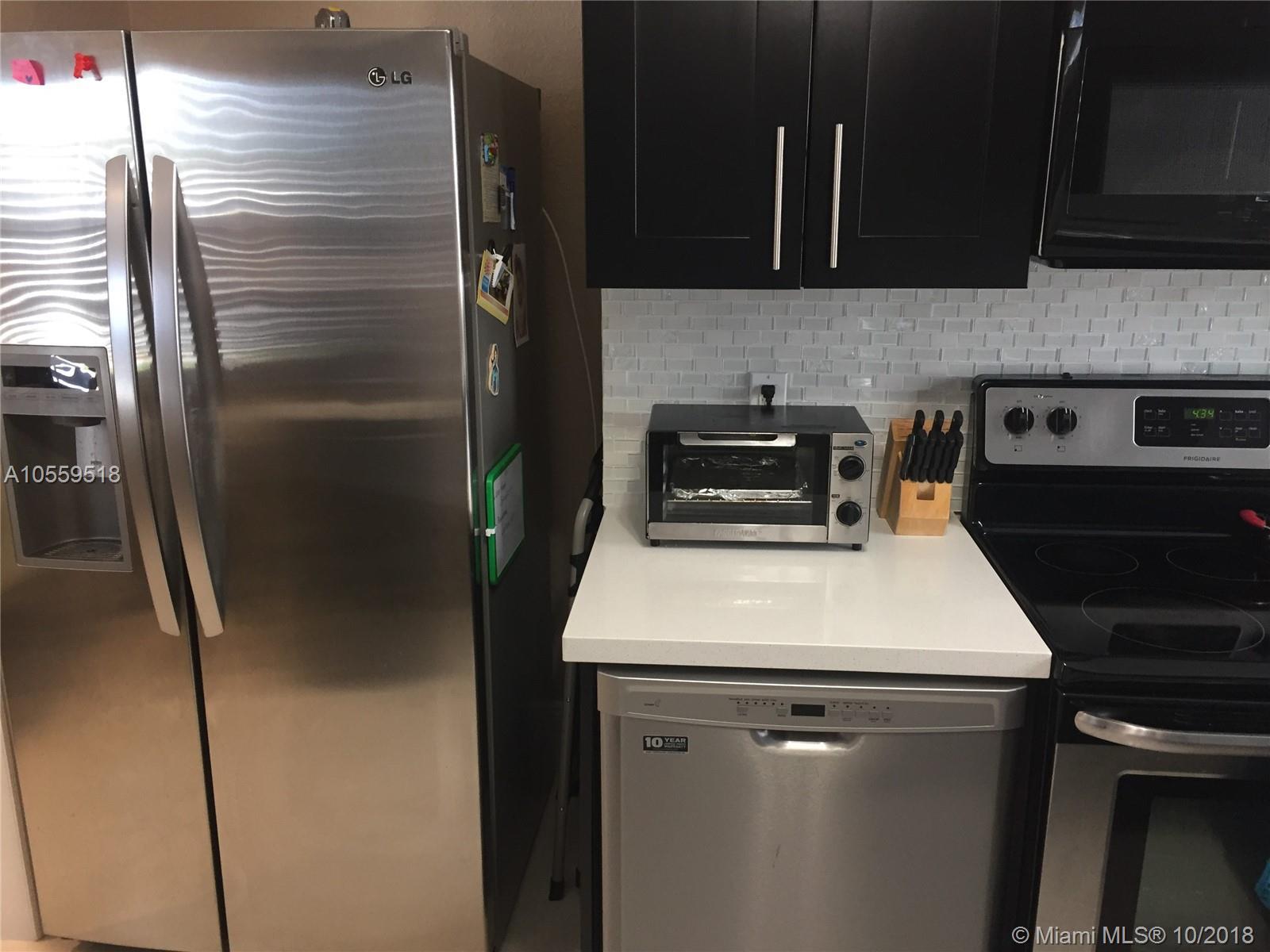 7715 Raleigh Street, Unit 7715 Hollywood, FL 33024 - Photo 5 of 14