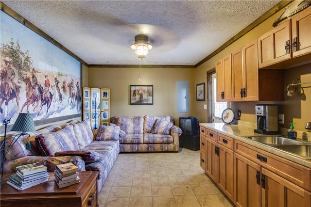 13920 Patterson Road College Grove, TN 37046 - Photo 4 of 30 The barn lounge is a great place to cool off in the heat of the Summer or grab a cup of cocoa in Winter. It adjoins the bath which includes washer/dryer and shower.