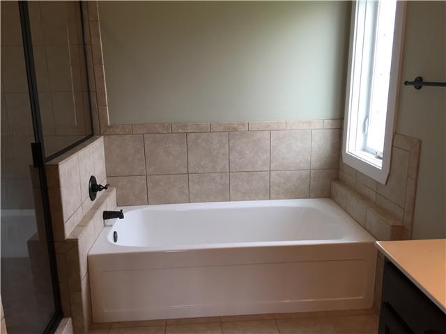 3120 Wilson Overall Road Murfreesboro, TN 37127 - Photo 17 of 25 over sized tub in master with tile surround.