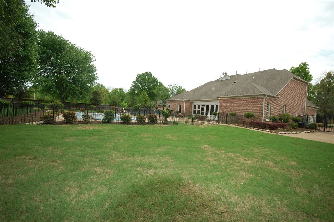 590 Dusk Ridge Road Collierville, TN 38017 - Photo 24 of 25 View of the immense back yard, which showcases a distinguishing private garden!