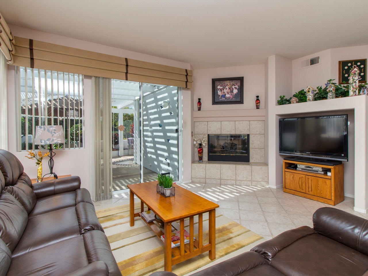 6047 Piros Way Oceanside, CA 92056 - Photo 7 of 25 The Family Room is located in the back of the home with access to the Backyard Patio.