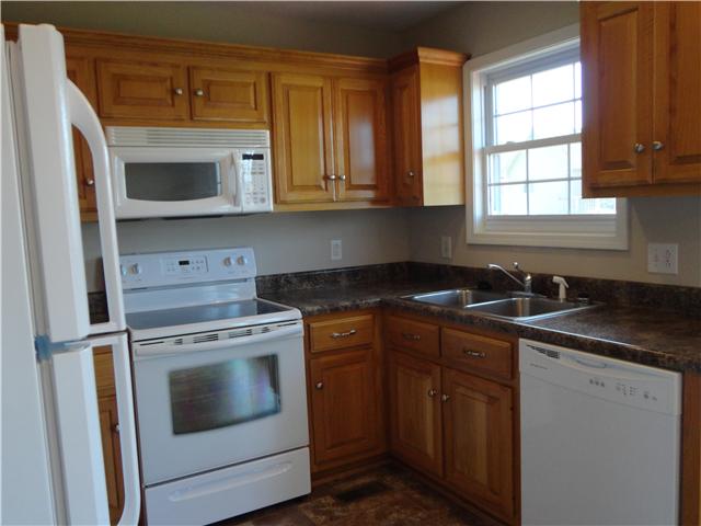 406 Arabian Lane Springfield, TN 37172 - Photo 6 of 14 Kitchen view with stove, built-in microwave and dishwasher. All appliances only 1 year old.