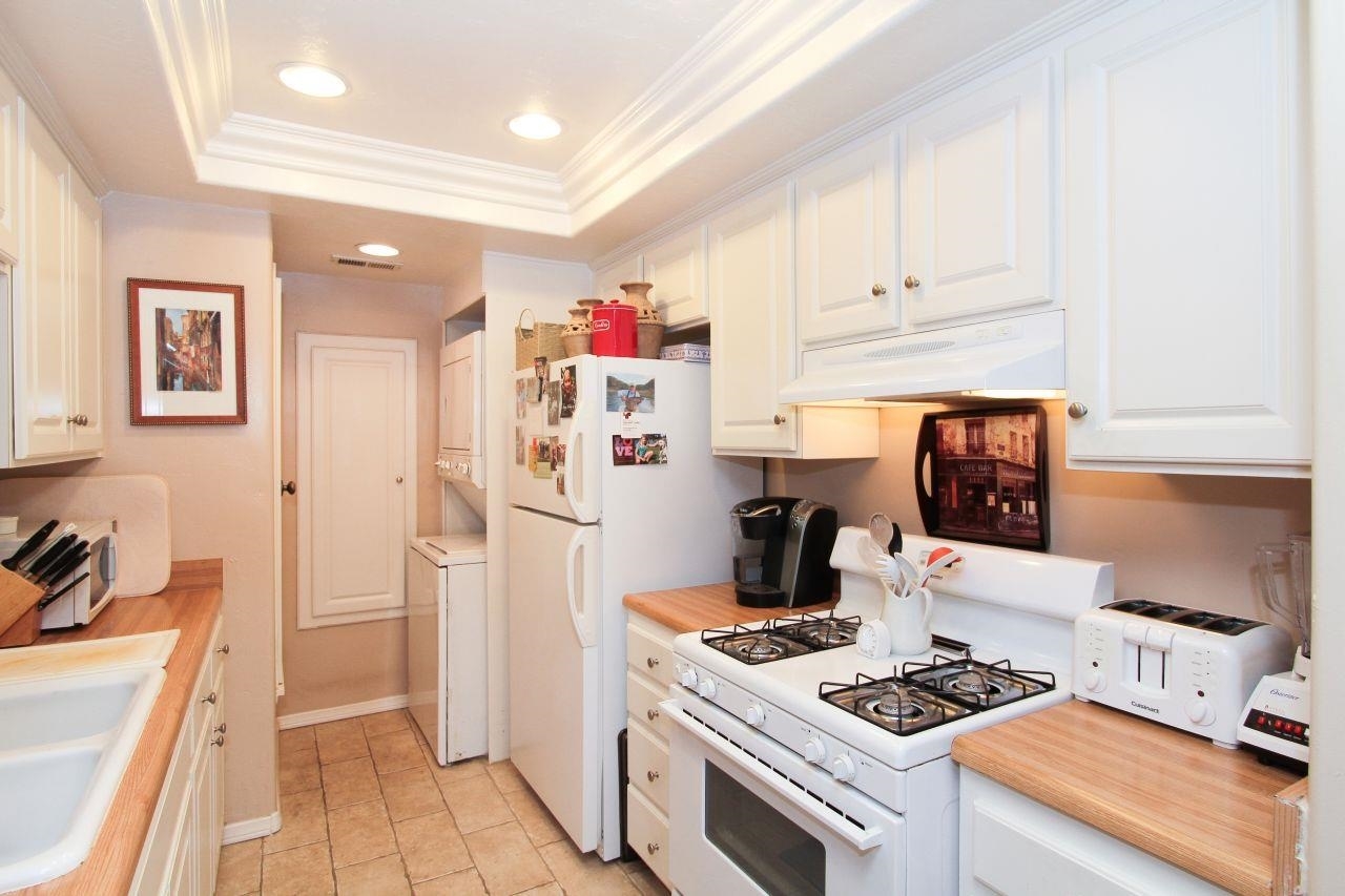 755 Brookstone Road, Unit 101 Chula Vista, CA 91913 - Photo 7 of 23 Kitchen has lots of storage along with recessed ceiling lighting.