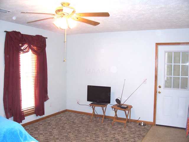 616 Unity Church Road Ramer, TN 38367 - Photo 14 of 19 Living Room in the In Law Quarters