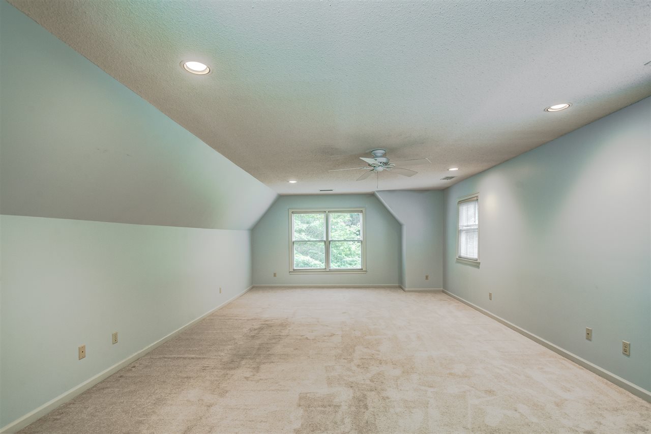 2044 Steeplebrook Drive Memphis, TN 38016 - Photo 21 of 25 Level 2 ~ Large room ~ Carpet ~ Ceiling fan ~ Closet