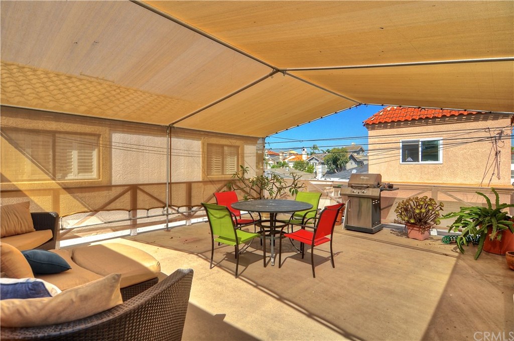 253 17th Street Seal Beach, CA 90740 - Photo 28 of 36 Extra Large Private Deck above the 2 car garage