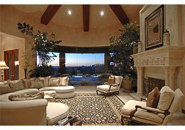 6890 St Andrews Road Rancho Santa Fe, CA 92067 - Photo 9 of 15 A view at sunset from the large formal living room.