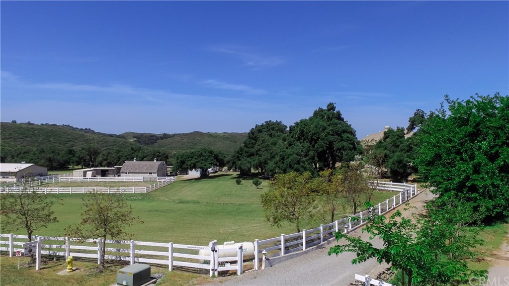 38421 Carrillo Road Fallbrook, CA 92028 - Photo 6 of 57 LEVEL PASTURE AND ARENA. BARN AND OUTBUILDINGS