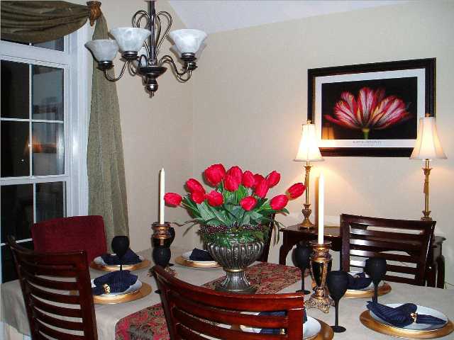 634 Portersville Road Atoka, TN 38004 - Photo 8 of 9 HARDWOOD FLOORS AND HIGH CEILINGS CREATE A GRACEFUL DINING SPACE