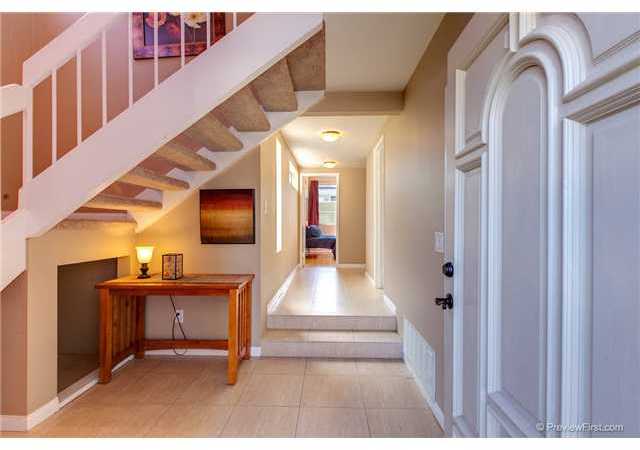 1758 Kennington Road Encinitas, CA 92024 - Photo 10 of 25 This is the front entry showing beautiful architecture to hallway and stairs.
