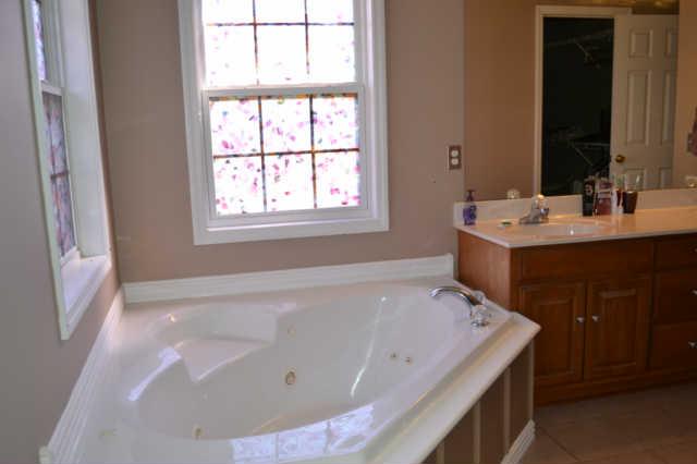 986 North Dickerson Chapel Road Lebanon, TN 37087 - Photo 8 of 24 DOUBLE VANITIES SEPARATE SHOWER - MASTER BATH HAS WHIRLPOOL TUB