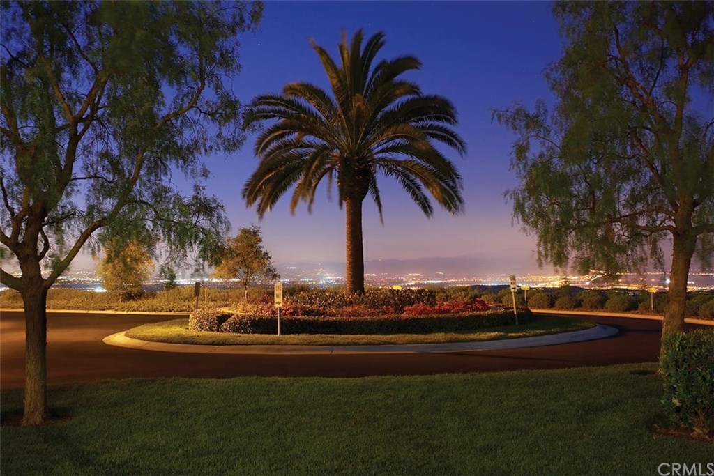 4 San Sovino Newport Coast, CA 92657 - Photo 6 of 8 Enjoy city light views at night from the front patio.