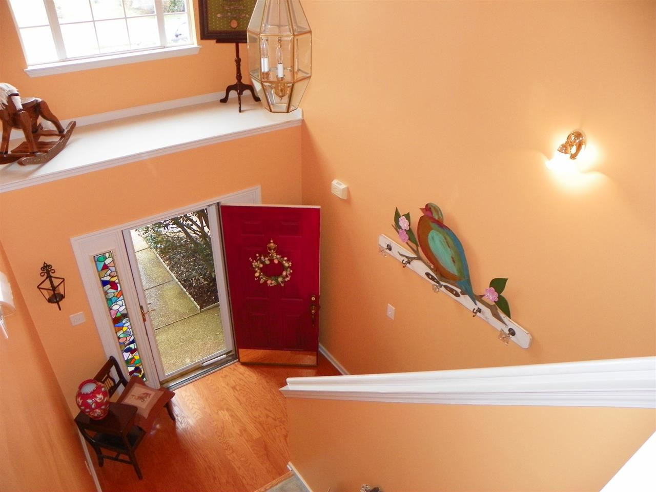 10097 Cross Ridge Road Cordova, TN 38018 - Photo 10 of 18 2nd story view to front door entry. Hardwood, sidelights and plant shelf accent entry.