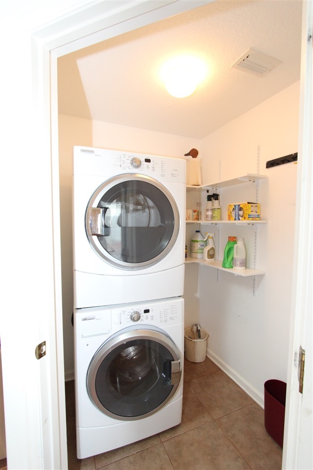 121 Cedar Ridge Circle St. Augustine, FL 32080 - Photo 10 of 22 Convenient yet out of sight! Lots of room for laundry and pantry items. All at your fingertips in the kitchen!