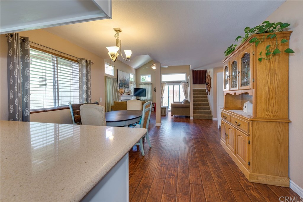 4492 Goldfinch Way Oceanside, CA 92057 - Photo 1 of 1 View from Kitchen to living room. Nice and open. With designer wood look flooring.