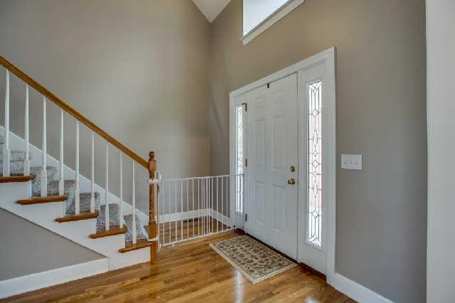 8699 12 Corners Road Lascassas, TN 37085 - Photo 2 of 10 Foyer entry with hardwood floors and cathedral ceilings.