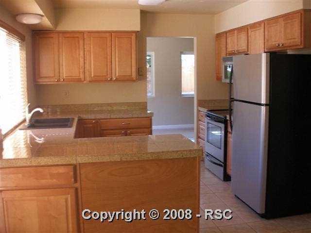 605 Gilcrest Road Colorado Springs, CO 80906 - Photo 3 of 13 Eat in kitchen