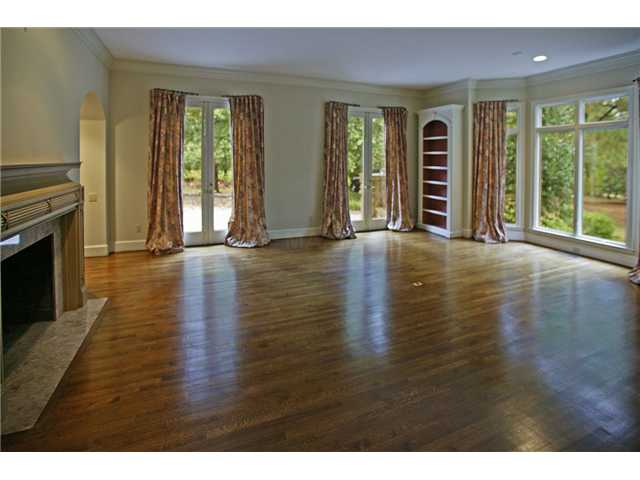 175 Waring Road Memphis, TN 38117 - Photo 4 of 12 Traditional living room with bookcases, tall ceilings and french doors.