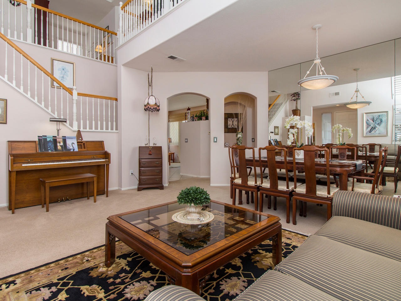 6047 Piros Way Oceanside, CA 92056 - Photo 6 of 25 The formal Dining Room has floor to ceiling mirrors making the entire area seam spacious.