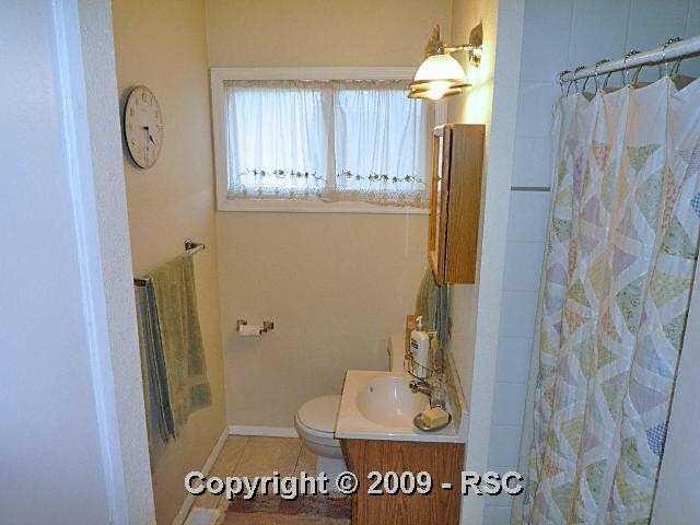 1310 West Cheyenne Road Colorado Springs, CO 80906 - Photo 7 of 12 Full Bath with Ceramic Tile