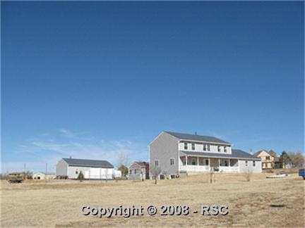 11600 Green Spring Road Colorado Springs, CO 80925 - Photo 2 of 15 Faraway shot of house & grounds.