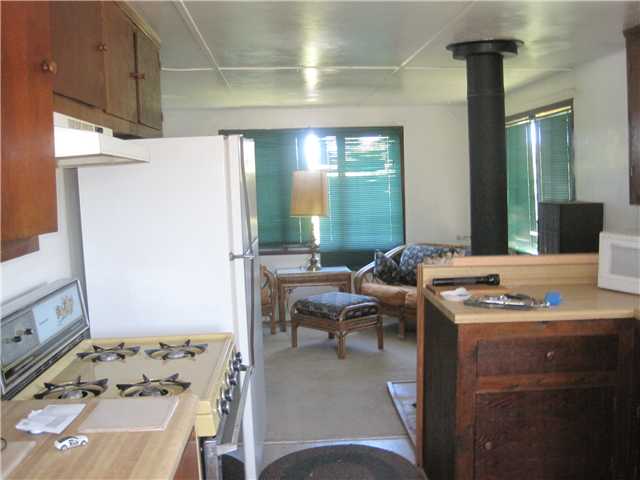 780 Forrest Gate Road Campo, CA 91906 - Photo 12 of 25 Guest house view from kitchen to living room