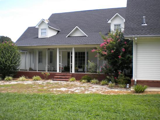 2925 Roarks Cove Road Decherd, TN 37324 - Photo 5 of 30 REAR OF HOME WITH COVERED PORCH